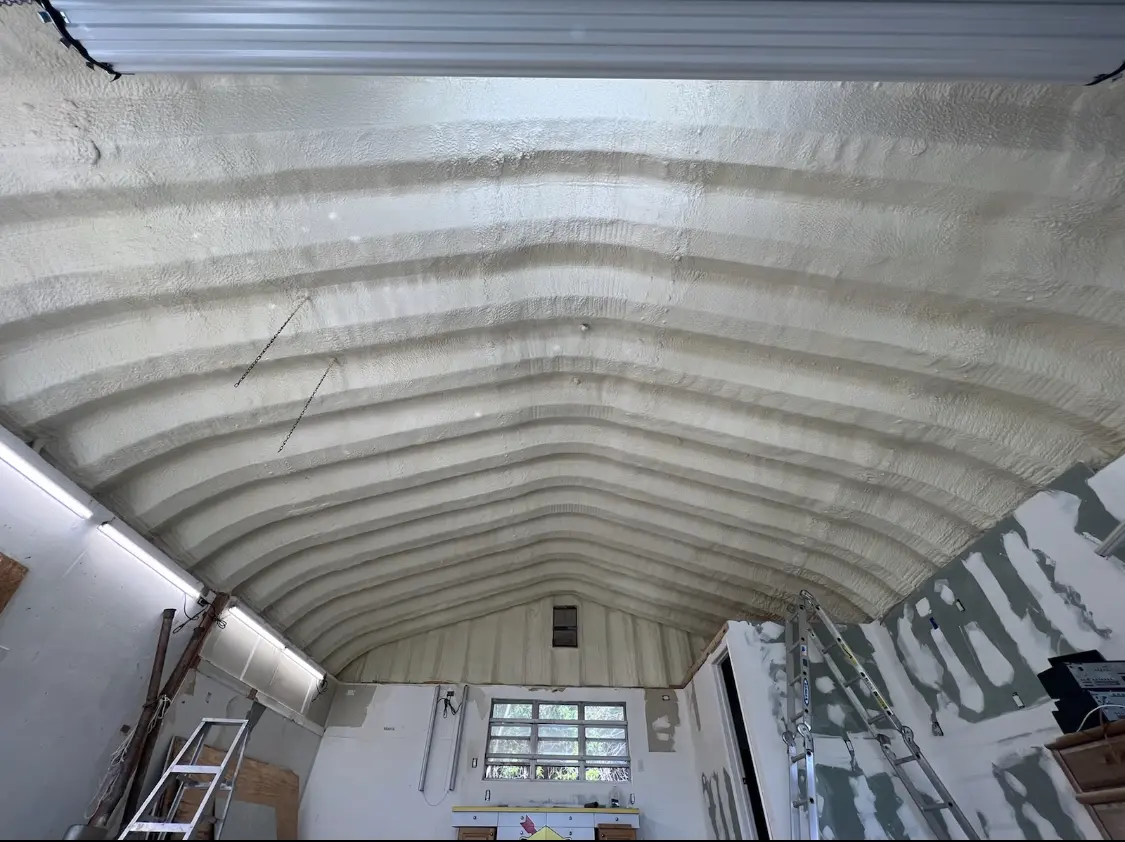 Spray polyurethane foam applied to the underside of a metal roof deck in Snoqualmie